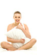 Woman sitting with a pillow