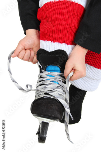 Photo: Tying skates Tying skates