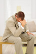 Employee thinking about mistakes in his job