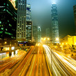 moving car with blur light through city at night