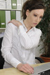 Business woman suffering from severe neck pain