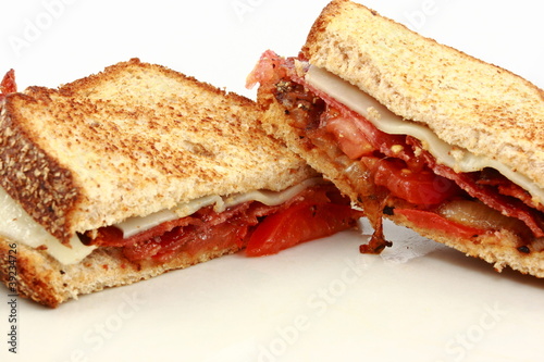 Photo: Grilled Sandwich With Bacon, Tomato, and Onion Grilled Sandwich With Bacon, Tomato, and Onion