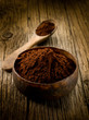 cacao powder on wood bowl