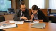 Video: Young man and woman working with tablet portrait Young man and woman working with tablet portrait
