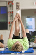 Seniors exercising in a health club
