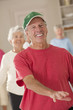 Seniors exercising in a health club