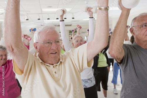 Photo: Senior people exercising with dumbbells Senior people exercising with dumbbells