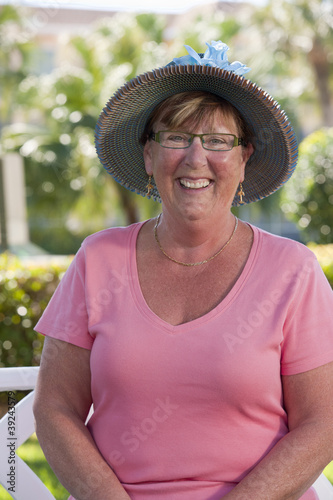 Photo: Portrait of a senior woman smiling Portrait of a senior woman smiling