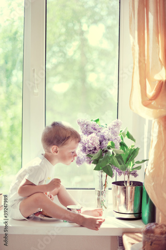 Photo: The child at a window The child at a window