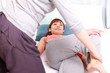young japanese woman getting chiropractic