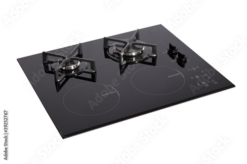 Photo: Black glass electric-gas hob with clipping path Black glass electric-gas hob with clipping path