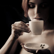 Beautiful Woman Drinking Coffee. Space for text