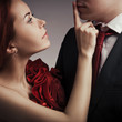 Portrait of young elegant couples in the tender passion
