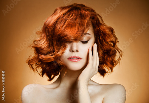 Photo: Beauty Portrait. Curly Hair Beauty Portrait. Curly Hair