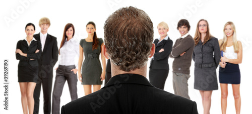 Photo: Menager talking with group of businesspeople Menager talking with group of businesspeople