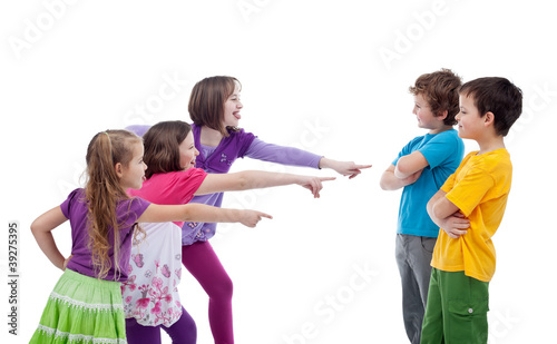 Photo: Girls mocking boys - school bullying concept Girls mocking boys - school bullying concept