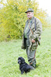 hunter with his dog hunting