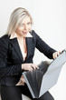 portrait of young businesswoman with folders