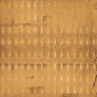 Grunge gold background with ancient floral ornament Grunge gold background with ancient floral ornament