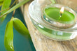 Photo: Green lit candle Green lit candle