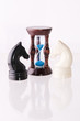 Two chess horses with sand-clock