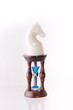 White chess horse with sand-clock