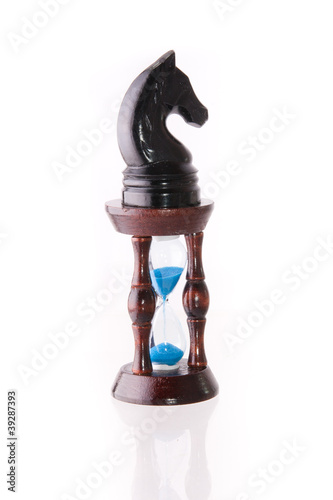Photo: Black chess horse with sand-clock Black chess horse with sand-clock