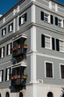 apartment building with flowers and windows.
