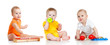 Children playing with musical toys. Isolated on white background