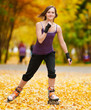 Photo: Woman on roller skates in the park Woman on roller skates in the park