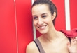 Portrait of a pretty female during a break from gym