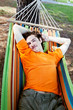 The young man has a rest in a hammock