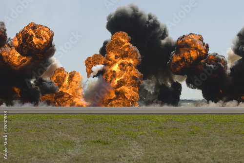 Photo: Multiple large explosions on airport runway Multiple large explosions on airport runway