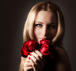 Stylish woman holding roses flower Stylish woman holding roses flower
