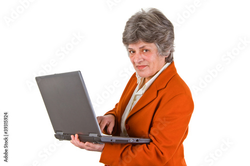 Foto: Seniorin mit Laptop Seniorin mit Laptop