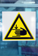 Danger sign on a glass wall