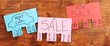 Color advertisements on wooden background