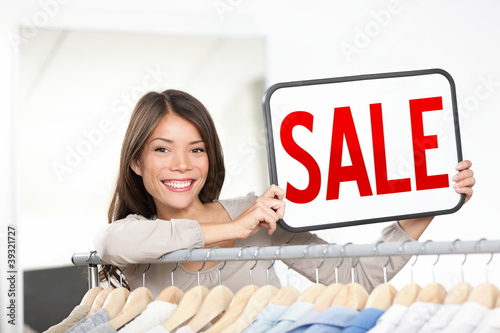 Photo: Shop owner sale sign Shop owner sale sign