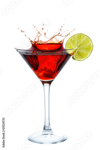 Photo: Cosmopolitan Cocktail with splash isolated on white Cosmopolitan Cocktail with splash isolated on white