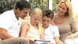 Video: Young Family with Wireless Tablet in Home Setting Young Family with Wireless Tablet in Home Setting