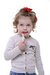 little girl playing with her mother makeup