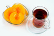Foto: Tea with peach jam on white background Tea with peach jam on white background