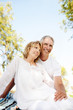 Foto: Mature couple smiling and embracing. Mature couple smiling and embracing.