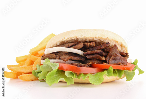 Photo: isolated kebab and french fries isolated kebab and french fries