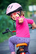 Foto: little girl cyclist little girl cyclist