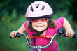 Foto: little girl cyclist little girl cyclist