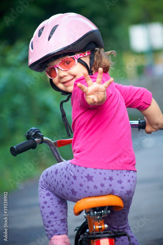 Photo: little girl cyclist little girl cyclist