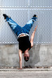 Photo: Young male dancer hip hop dancing urban scene Young male dancer hip hop dancing urban scene