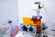 modern microscope in a lab  (color toned image; shallow DOF)