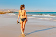 Photo: Young woman on the beach Young woman on the beach